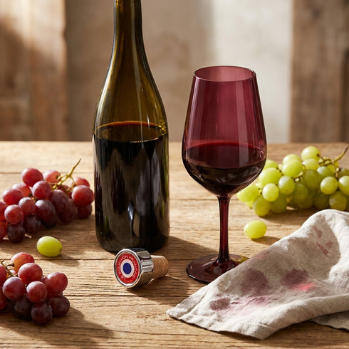 Bouchon bouteille de vin rond rouge en situation