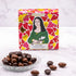 Boîte de chocolats Love Mona de Maison Vertigo et une coupelle d'amandes au chocolat