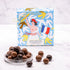Boîte de chocolats Liberté chocolatée de Maison Vertigo et une coupelle de billes au chocolat