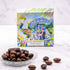 Boîte de chocolats Délices impressionnistes de Maison Vertigo et une coupelle d'amandes au chocolat