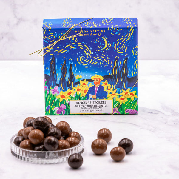Boîte de chocolats Douceurs étoilées de Maison Vertigo et une coupelle de billes au chocolat