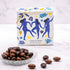 Boîte de chocolats La Danse des arômes de Maison Vertigo et une coupelle d'amandes au chocolat