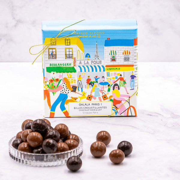 Boîte de chocolats Ohlala Paris ! de Maison Vertigo et une coupelle de billes au chocolat