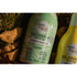 Gel douche Amande douce Born to Bio posé sur des feuilles d'automne