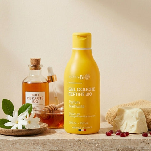 Gel douche Miel karité Born to Bio près d'un pot de miel