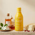 Gel douche Miel karité Born to Bio près d'un pot de miel