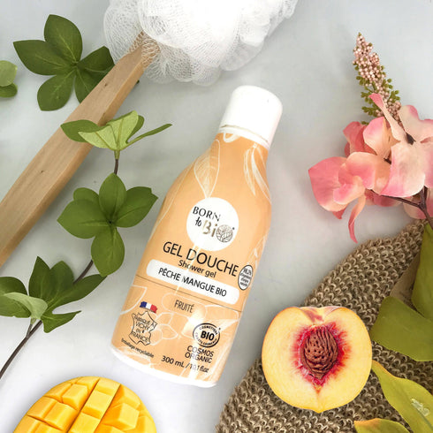 Gel douche Pêche mangue Born to Bio entouré de fruits