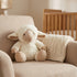 Peluche Bouillotte Mouton - L'Artisan du Bien-Être, en situation cosy